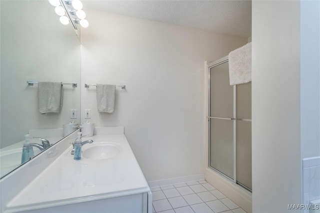 847 Dee Dr, Prattville, AL 36066 - bathroom with a stall shower, tile patterned floors, and vanity