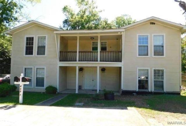 4097 Narrow Lane Rd, Montgomery, AL 36111 - rear view of house with a balcony