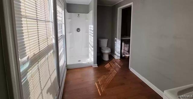 4097 Narrow Lane Rd, Montgomery, AL 36111 - hallway featuring wood finished floors and baseboards
