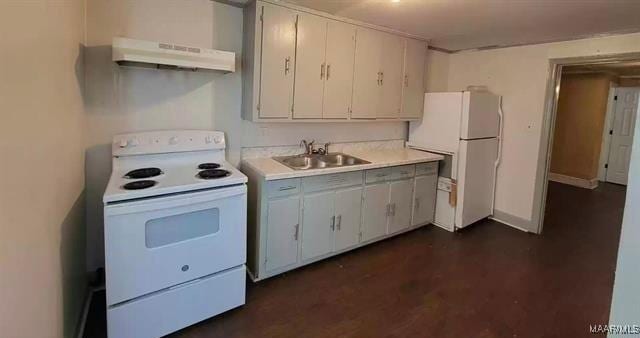 4097 Narrow Lane Rd, Montgomery, AL 36111 - kitchen featuring white appliances, a sink, under cabinet range hood, light countertops, and baseboards