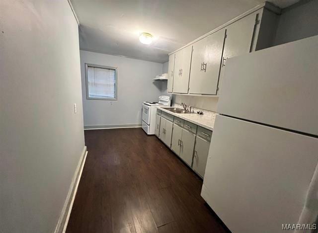 4097 Narrow Lane Rd, Montgomery, AL 36111 - kitchen featuring white appliances, a sink, light countertops, and dark wood-style flooring