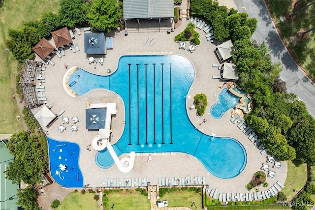drone / aerial view of a pool