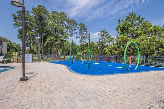 view of pool with fence