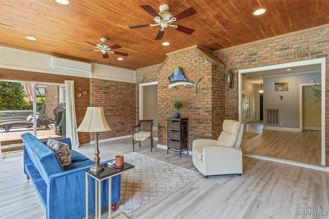 living area with a wall unit AC, wooden ceiling, brick wall, a ceiling fan, and crown molding