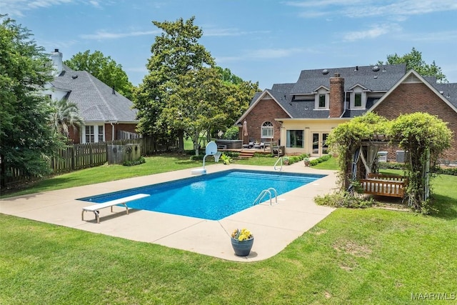 view of pool with a wooden deck, a diving board, a patio area, and a pergola