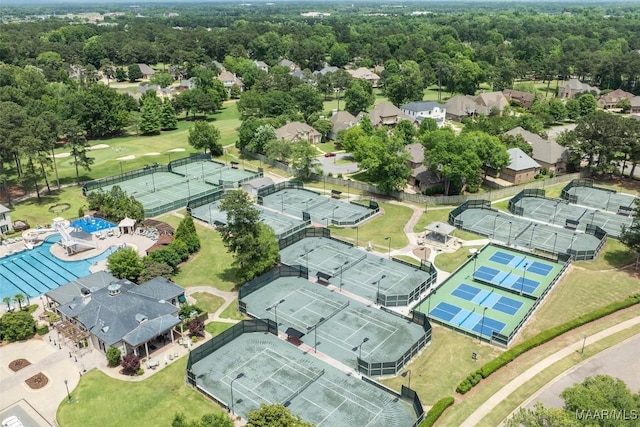 aerial view of residential area with a pool area