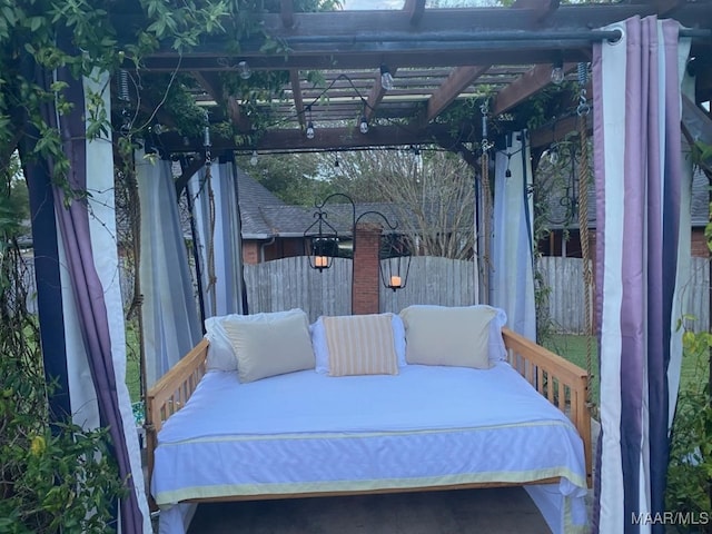 view of patio / terrace with a pergola and fence