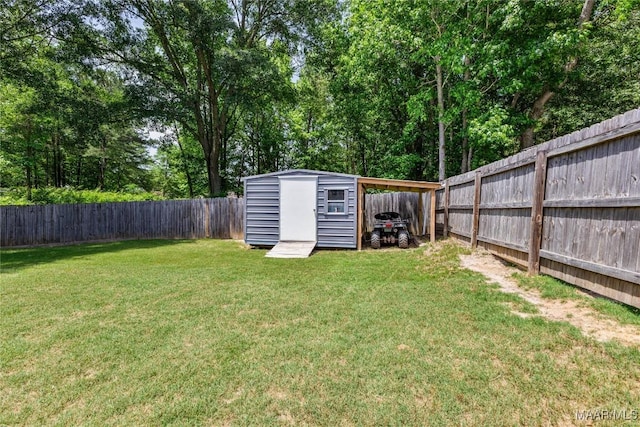view of yard featuring an outbuilding and a shed