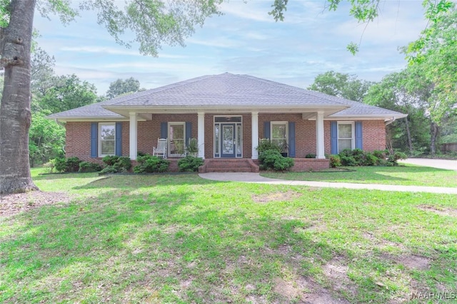 705 Yellowstone Dr, Prattville, AL 36067 - view of front of home featuring brick siding, a front yard, and covered porch