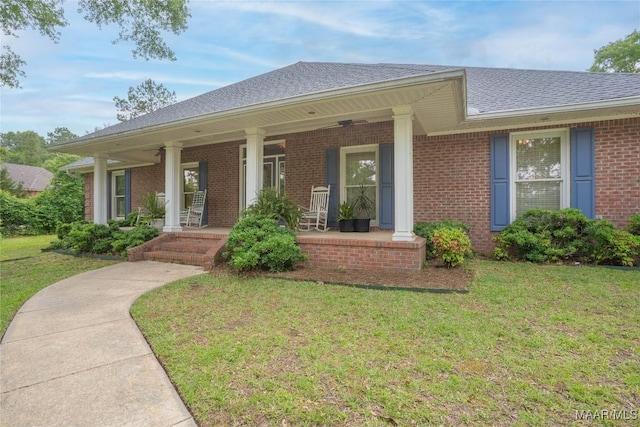 705 Yellowstone Dr, Prattville, AL 36067 - single story home featuring covered porch, a front lawn, brick siding, and roof with shingles