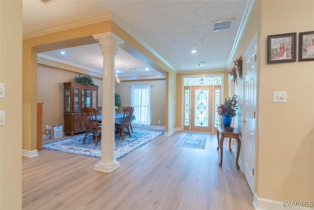 705 Yellowstone Dr, Prattville, AL 36067 - entryway featuring decorative columns, light wood-style floors, baseboards, ornamental molding, and recessed lighting
