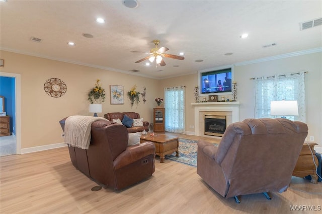 705 Yellowstone Dr, Prattville, AL 36067 - living room featuring light wood finished floors, a ceiling fan, recessed lighting, a tiled fireplace, and baseboards