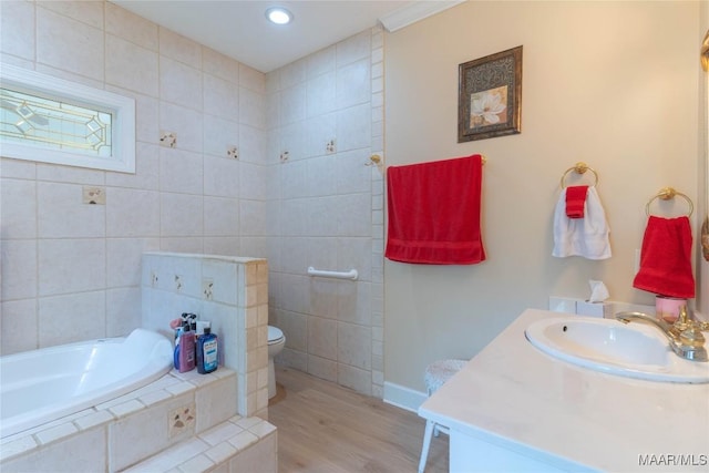 705 Yellowstone Dr, Prattville, AL 36067 - full bath featuring wood finished floors, a garden tub, toilet, vanity, and recessed lighting