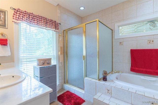 705 Yellowstone Dr, Prattville, AL 36067 - full bathroom with a stall shower, a garden tub, and vanity