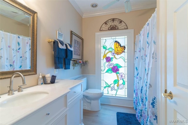 705 Yellowstone Dr, Prattville, AL 36067 - bathroom with toilet, healthy amount of natural light, vanity, wood finished floors, and ornamental molding