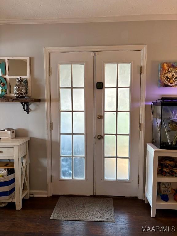 104 Carleton St, Prattville, AL 36067 - doorway to outside featuring french doors, crown molding, and dark wood-style flooring