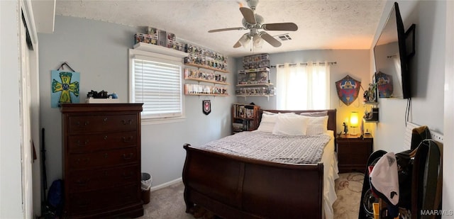 104 Carleton St, Prattville, AL 36067 - bedroom with a textured ceiling, carpet flooring, ceiling fan, and baseboards