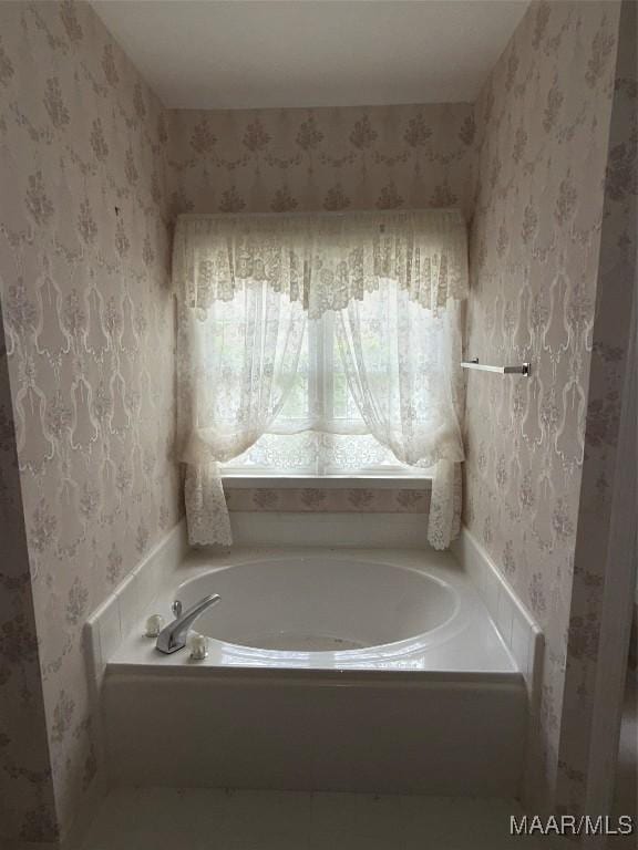 3504 Summerhill Dr, Montgomery, AL 36111 - bathroom with wallpapered walls and a garden tub