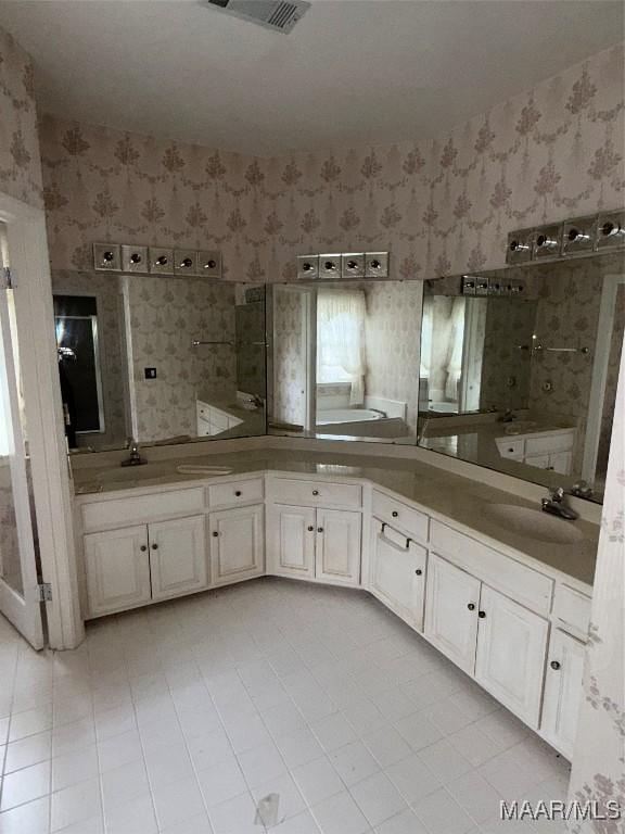 3504 Summerhill Dr, Montgomery, AL 36111 - bathroom with wallpapered walls, tile patterned floors, and double vanity