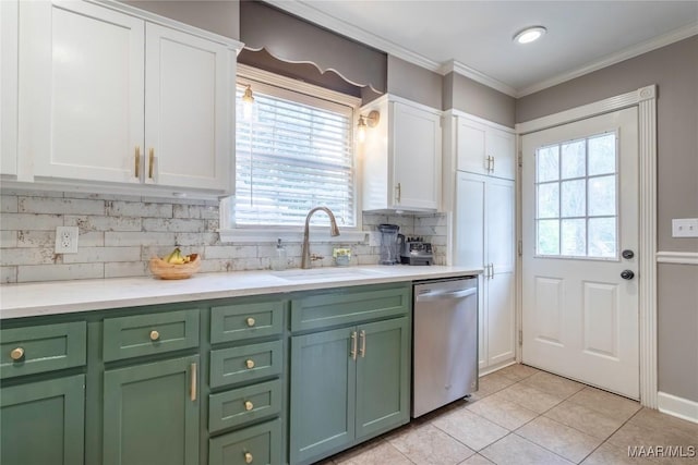 231 E Main St, Prattville, AL 36067 - kitchen with green cabinetry, stainless steel dishwasher, a sink, white cabinetry, and crown molding