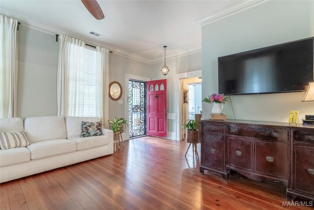 231 E Main St, Prattville, AL 36067 - living room featuring crown molding, wood-type flooring, and ceiling fan