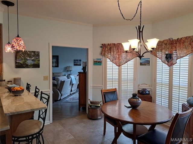 2564 Aimee Dr, Montgomery, AL 36106 - dining room featuring a chandelier, ornamental molding, and plenty of natural light