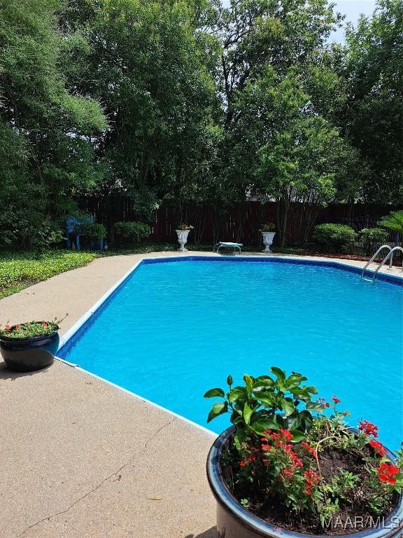 2564 Aimee Dr, Montgomery, AL 36106 - view of pool featuring a fenced backyard and a diving board