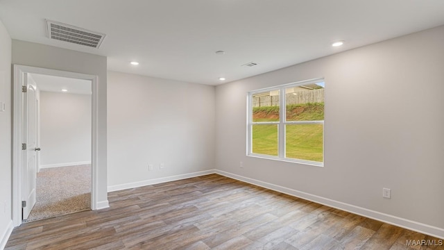 6004 Cunningham Trl, Montgomery, AL 36116 - empty room featuring wood finished floors, recessed lighting, and baseboards