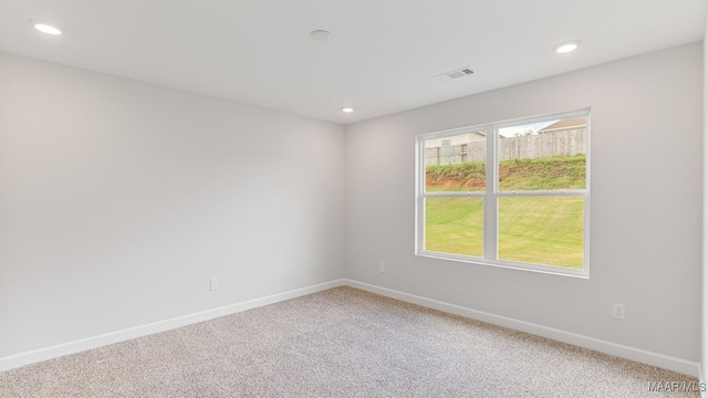 6004 Cunningham Trl, Montgomery, AL 36116 - empty room featuring light carpet, baseboards, and recessed lighting