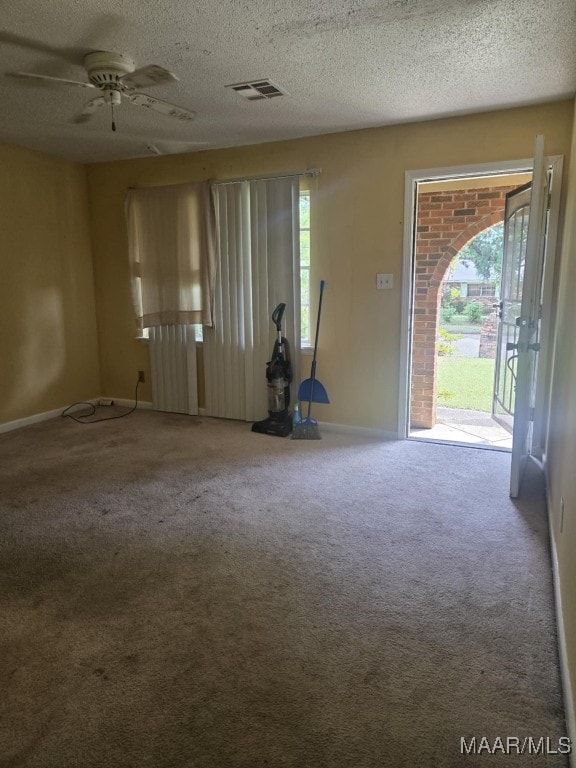 116 Longbrook Dr, Montgomery, AL 36110 - carpeted entryway featuring baseboards, a ceiling fan, and a textured ceiling