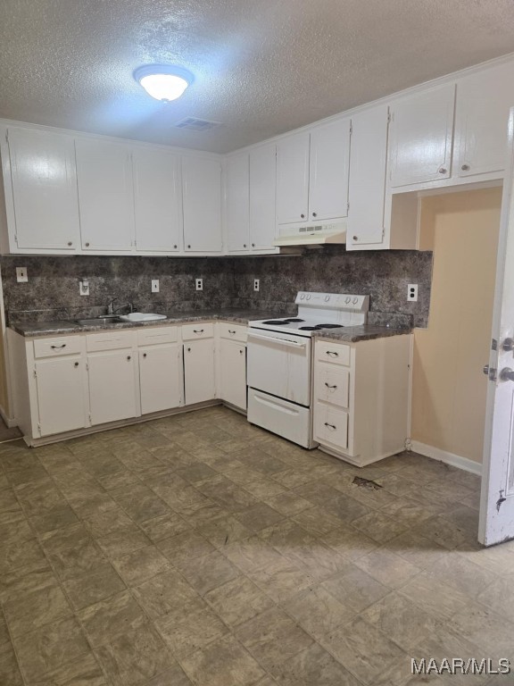 116 Longbrook Dr, Montgomery, AL 36110 - kitchen featuring electric range, a sink, a textured ceiling, white cabinetry, and backsplash
