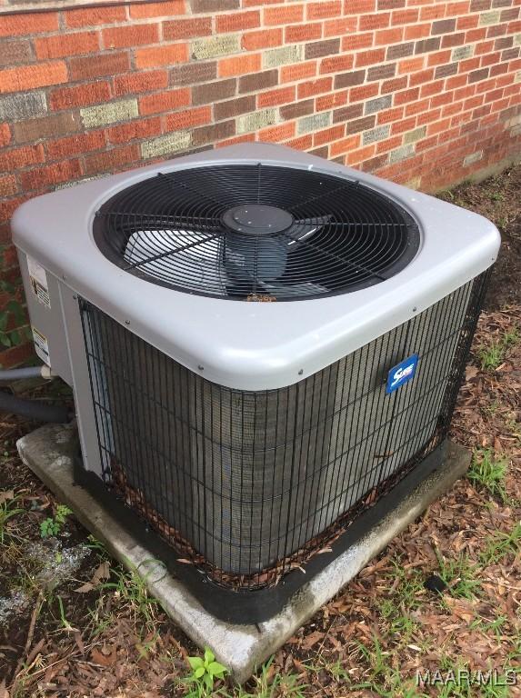 4037 Piedmont Dr, Montgomery, AL 36108 - exterior view of central AC unit and brick siding