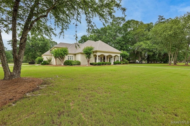 8625 Wynford Pl, Montgomery, AL 36117 - view of front of house featuring a front lawn and stucco siding