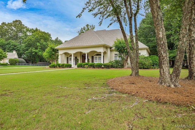 8625 Wynford Pl, Montgomery, AL 36117 - view of front of property featuring a front yard and stucco siding