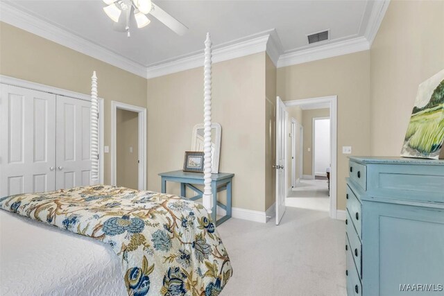 8625 Wynford Pl, Montgomery, AL 36117 - bedroom with ornamental molding, light colored carpet, baseboards, a closet, and a ceiling fan
