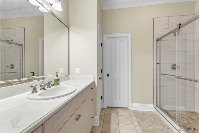 8625 Wynford Pl, Montgomery, AL 36117 - bathroom featuring a shower stall, tile patterned flooring, vanity, and ornamental molding
