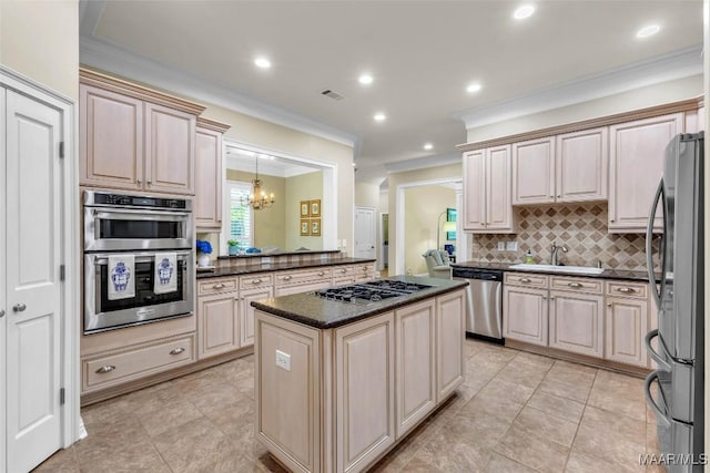 8625 Wynford Pl, Montgomery, AL 36117 - kitchen featuring appliances with stainless steel finishes, crown molding, a sink, tasteful backsplash, and a chandelier