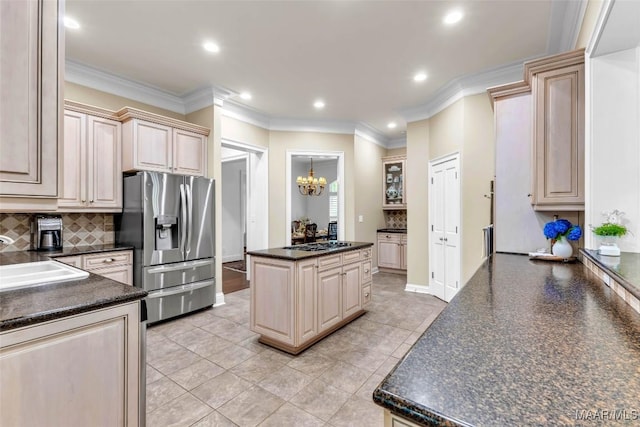 8625 Wynford Pl, Montgomery, AL 36117 - kitchen with stainless steel fridge with ice dispenser, dark countertops, a sink, decorative backsplash, and gas stovetop