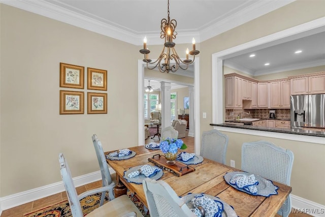 8625 Wynford Pl, Montgomery, AL 36117 - dining room with decorative columns, crown molding, a chandelier, baseboards, and recessed lighting