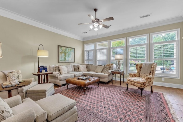 8625 Wynford Pl, Montgomery, AL 36117 - living room featuring plenty of natural light, crown molding, ceiling fan, light tile patterned floors, and baseboards