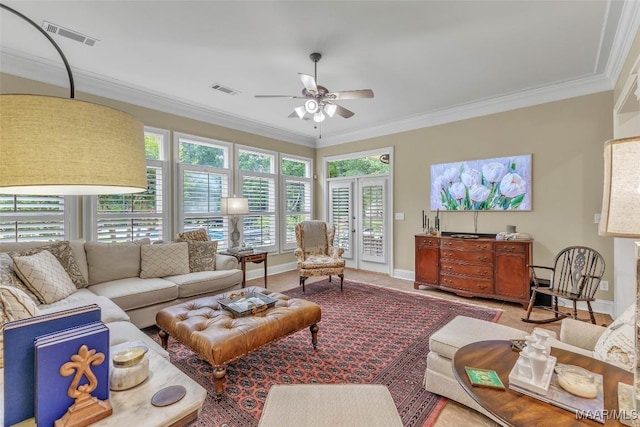 8625 Wynford Pl, Montgomery, AL 36117 - living area featuring ceiling fan, crown molding, and baseboards