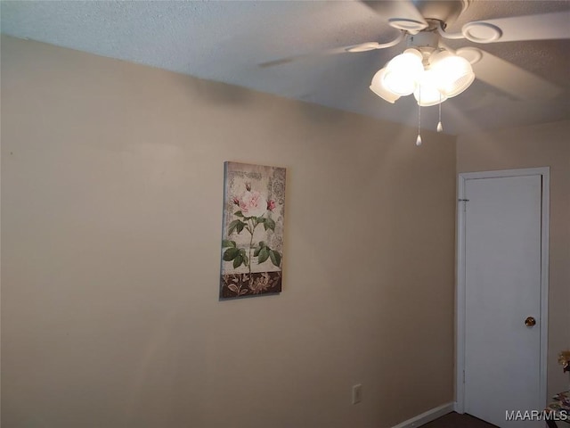 4804 Regal Dr, Montgomery, AL 36116 - unfurnished bedroom featuring a ceiling fan, a textured ceiling, and baseboards