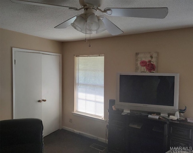 4804 Regal Dr, Montgomery, AL 36116 - carpeted home office with ceiling fan and a textured ceiling