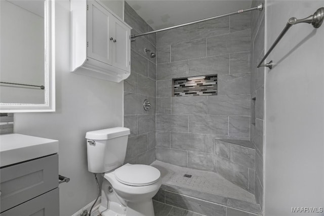 738 Forestdale Dr, Montgomery, AL 36109 - full bath with vanity, a tile shower, and toilet