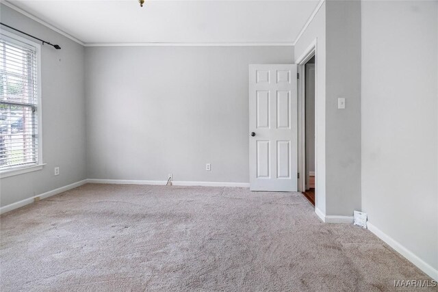 738 Forestdale Dr, Montgomery, AL 36109 - empty room featuring crown molding, carpet flooring, and baseboards