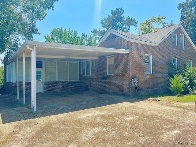 1801 County Road 69th Rd, Selma, AL 36701 - view of front of property featuring driveway, brick siding, and an attached carport