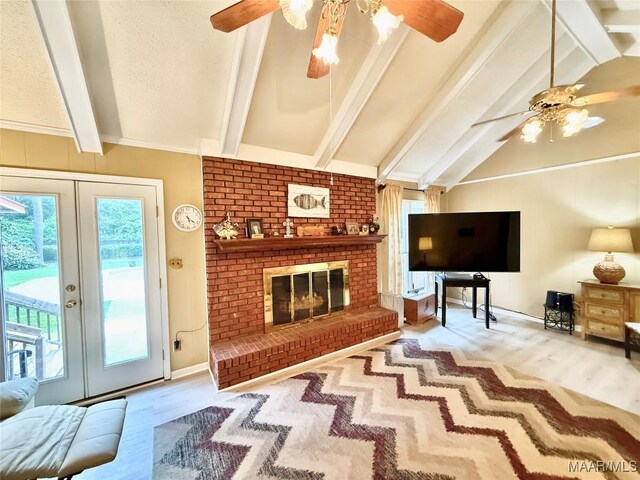 36 Wilkins Rd, Selma, AL 36701 - living area with ceiling fan, healthy amount of natural light, a brick fireplace, and baseboards