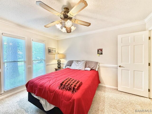 36 Wilkins Rd, Selma, AL 36701 - carpeted bedroom with crown molding, a textured ceiling, ceiling fan, and baseboards