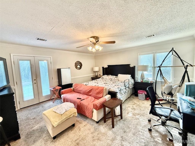 36 Wilkins Rd, Selma, AL 36701 - carpeted bedroom featuring french doors, access to exterior, a textured ceiling, crown molding, and a ceiling fan