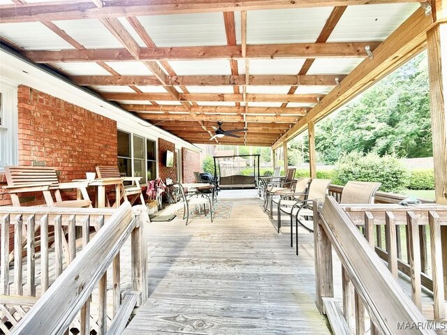 36 Wilkins Rd, Selma, AL 36701 - wooden terrace with outdoor dining area and a ceiling fan